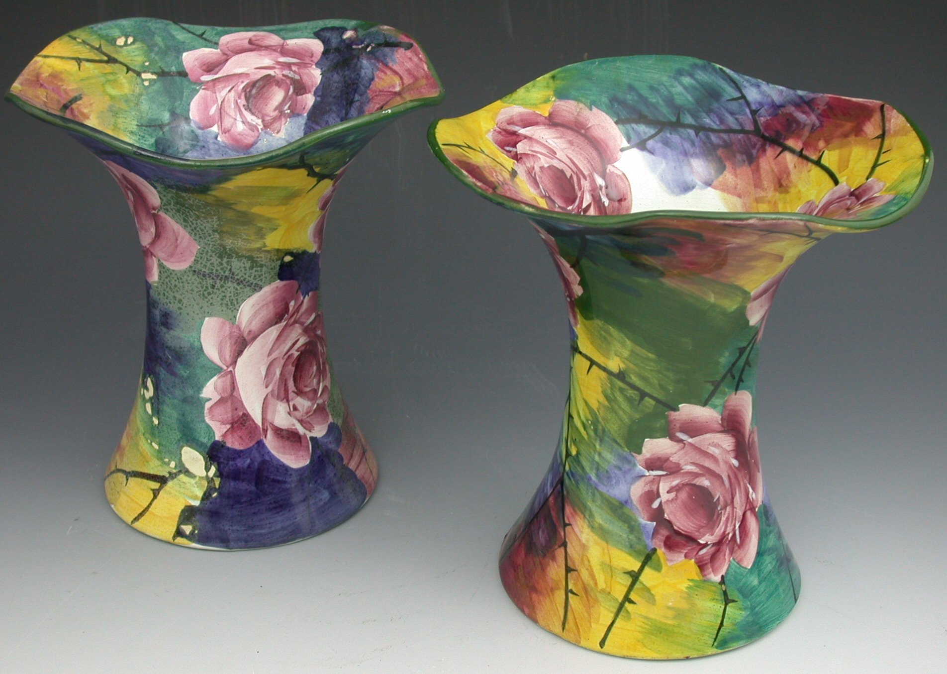 A near pair of Wemyss Lady Eva vases,