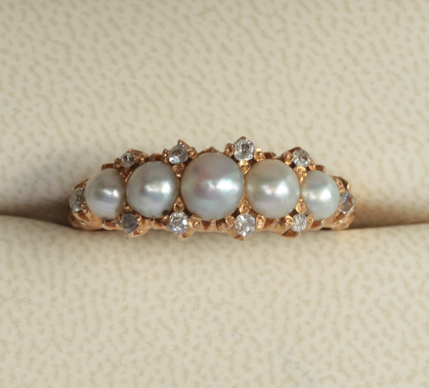 A pearl set ring