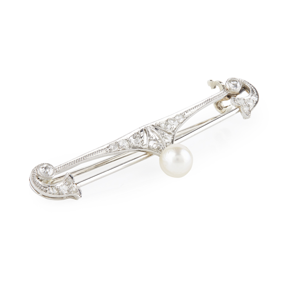 An early 20th century diamond and pearl set bar brooch
