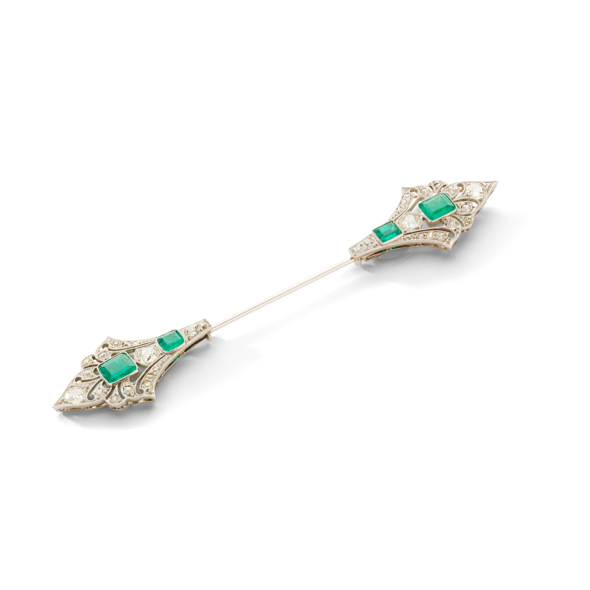 An early 20th century emerald and diamond jabot pin