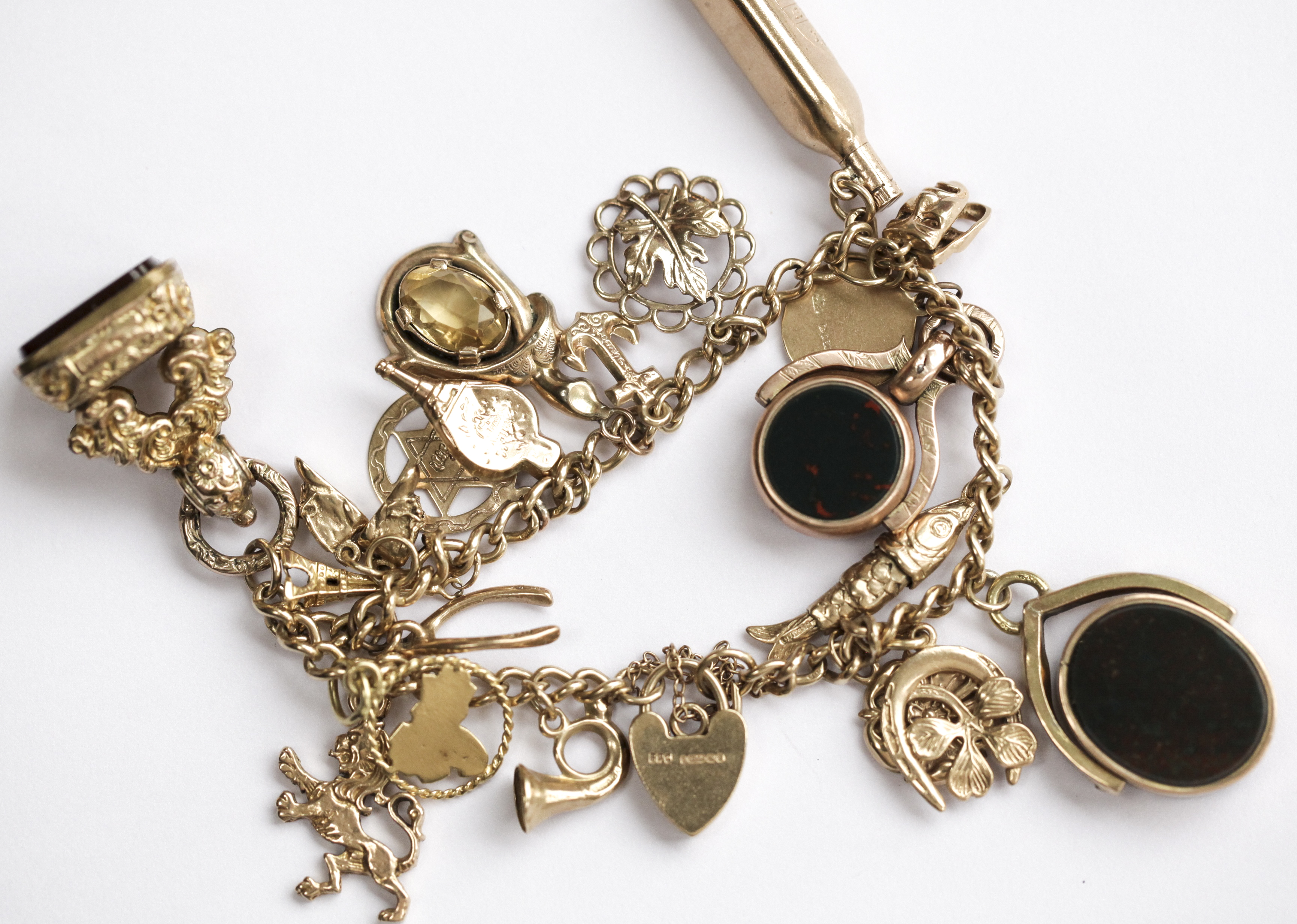 A 9ct gold charm bracelet