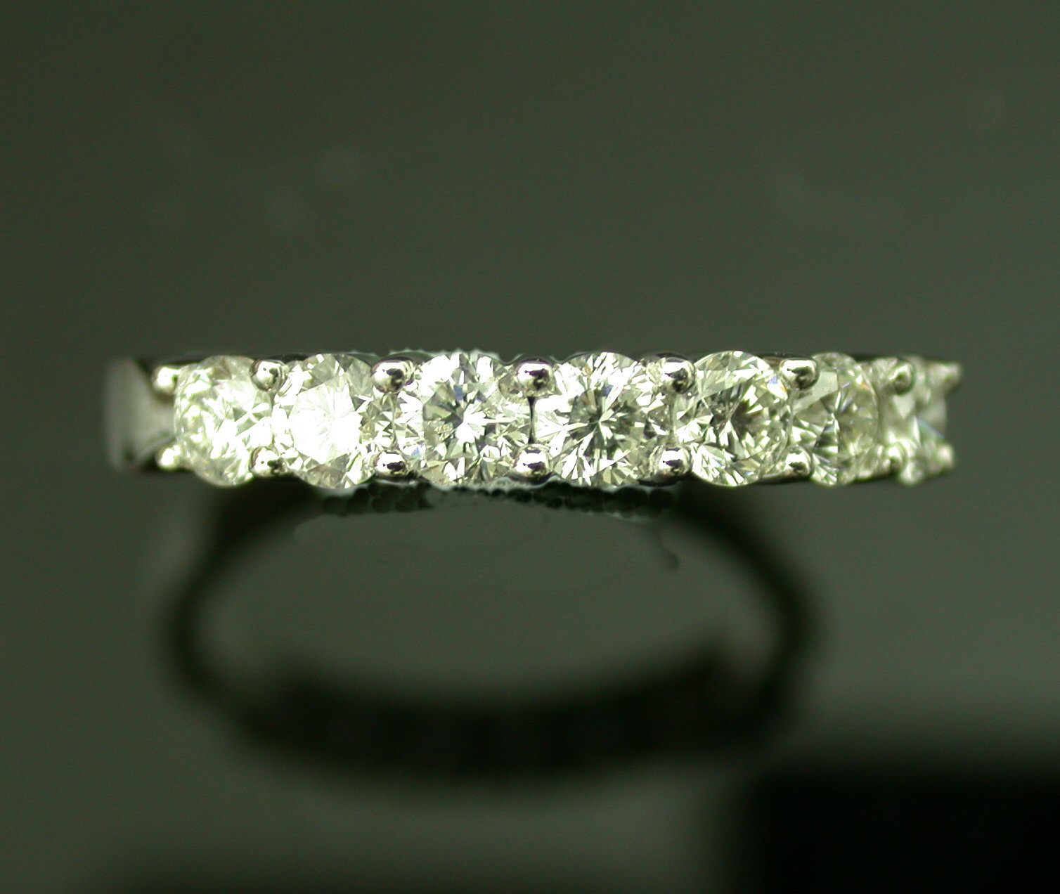 A diamond half eternity ring,