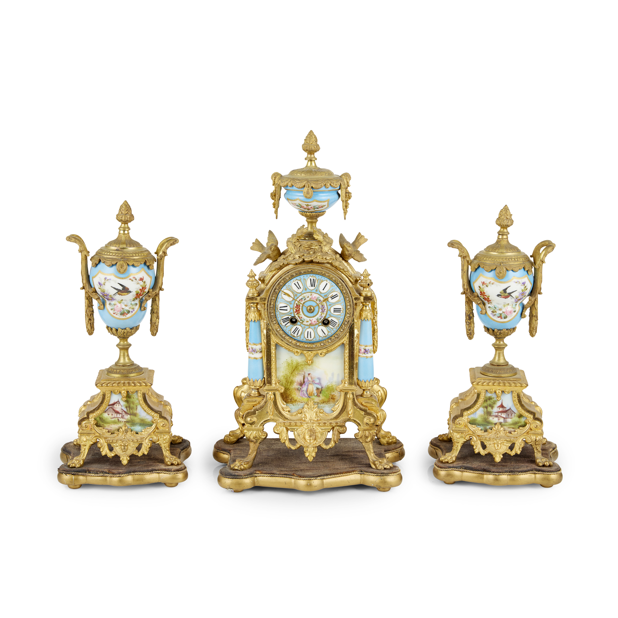 FRENCH GILT BRONZE AND PORCELAIN CLOCK GARNITURE