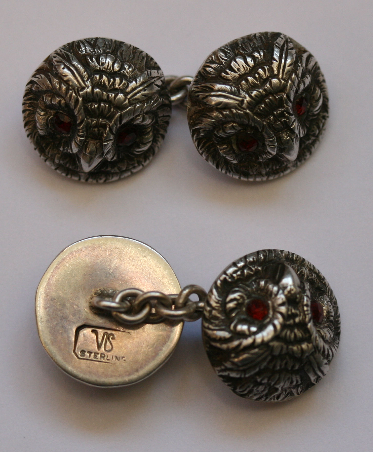 A pair of garnet set cufflinks