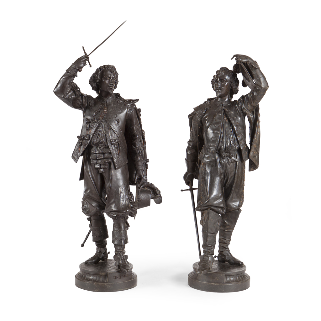 PAIR OF LARGE PATINATED SPELTER FIGURES OF CAVALIERS