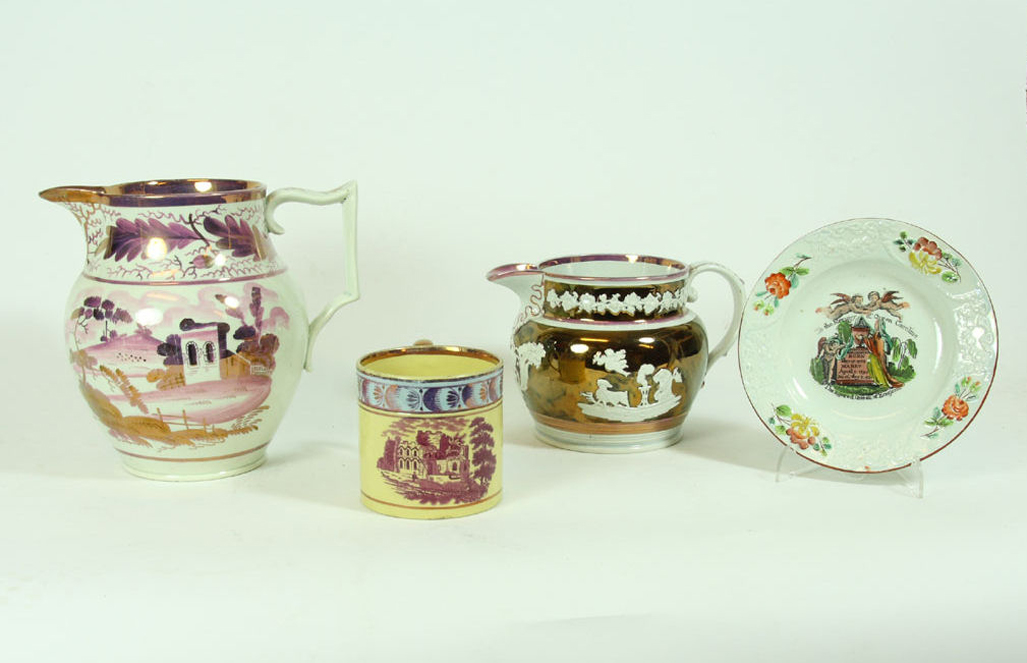 An early 19th century pink lustreware jug