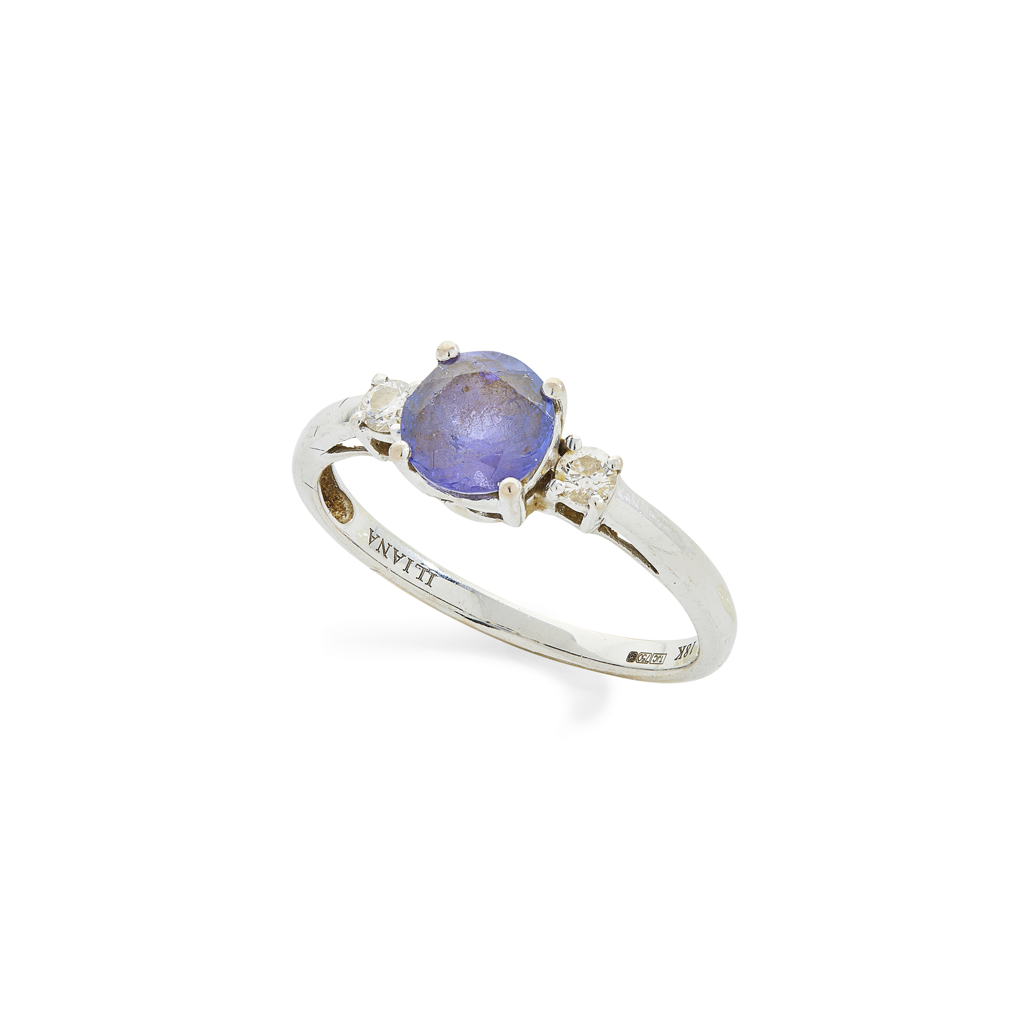 An 18ct gold Tanzanite and diamond ring