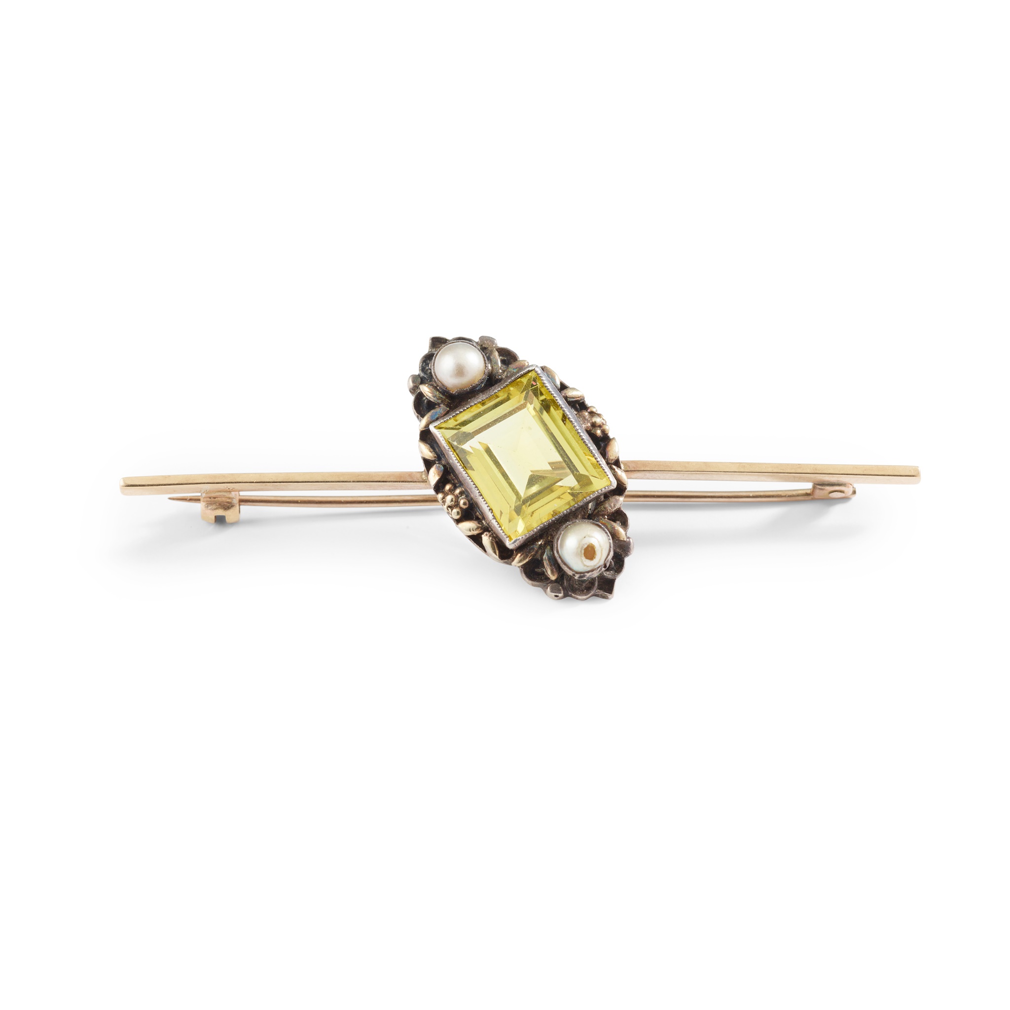 A yellow sapphire and pearl brooch