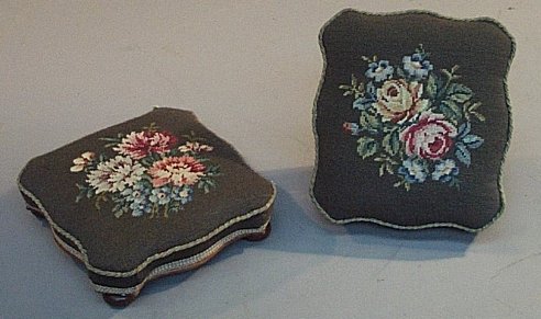 A pair of mahogany framed footstools