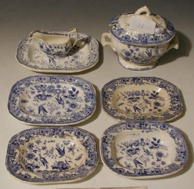 A miniature blue and white part dinner service