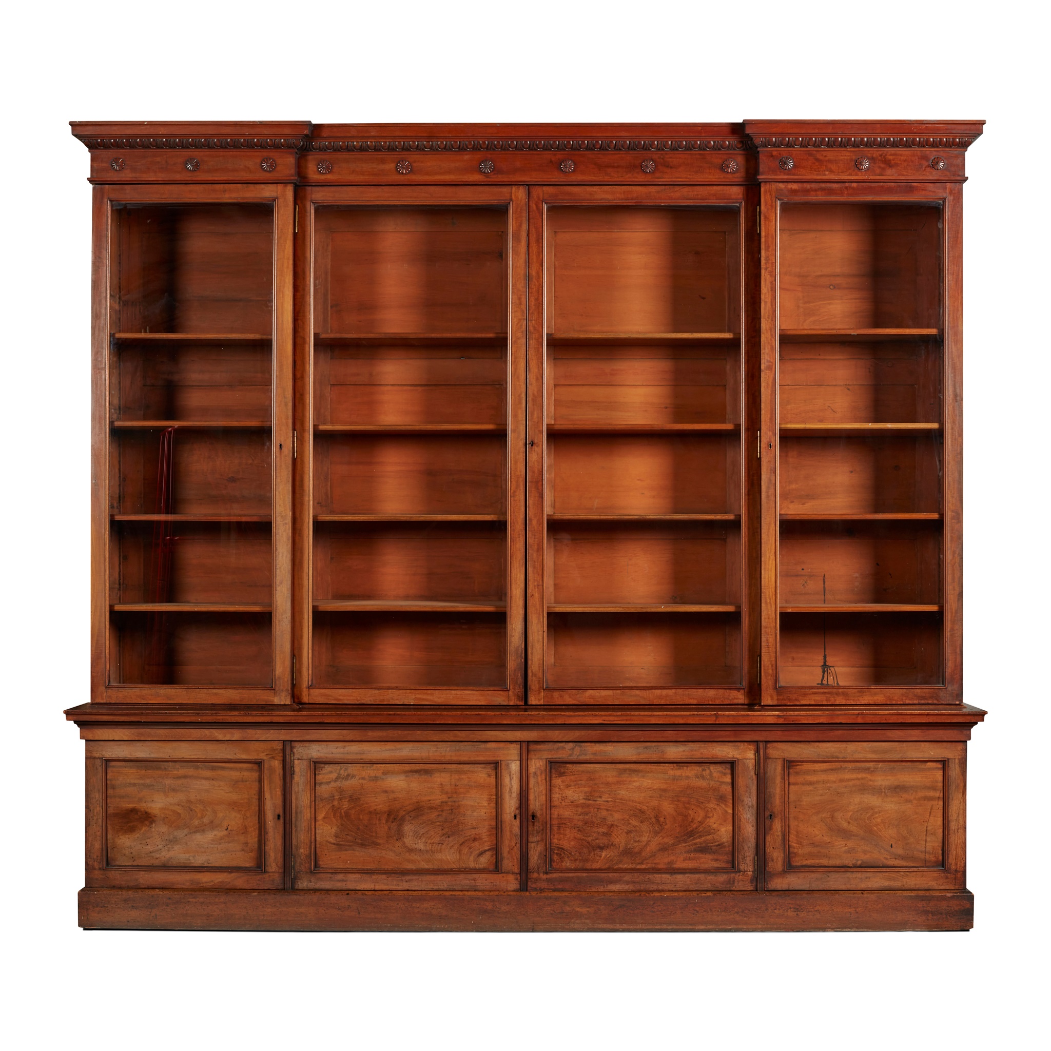 WILLIAM IV MAHOGANY INVERTED BREAKFRONT BOOKCASE