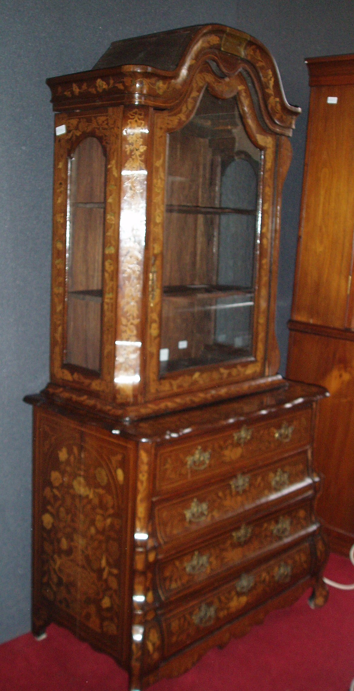 A late 18th / 19th century Dutch oak and walnut floral marquetry cabinet chest