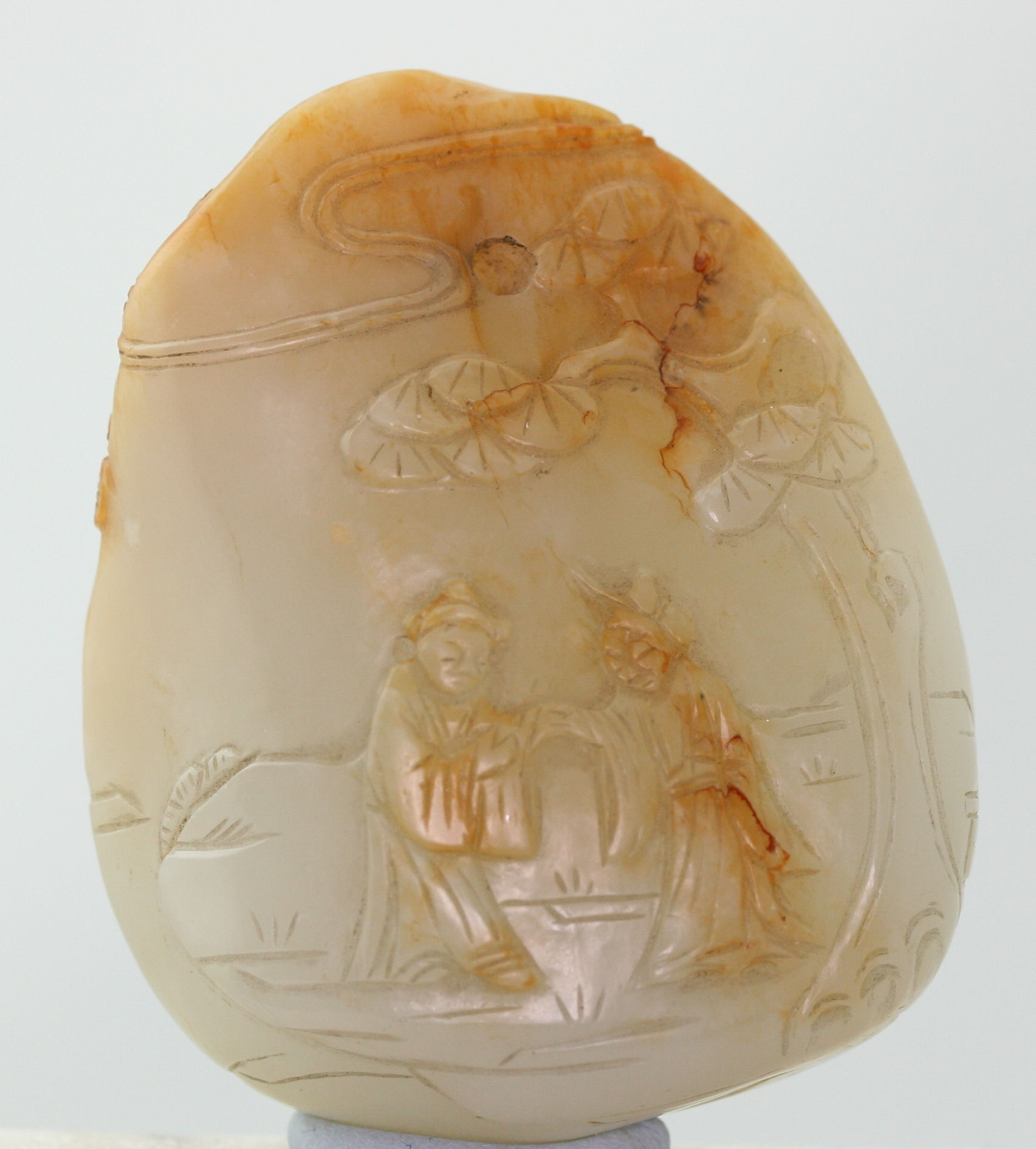 A large carved jadeite pendant