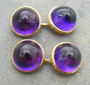 A pair of amethyst set cufflinks