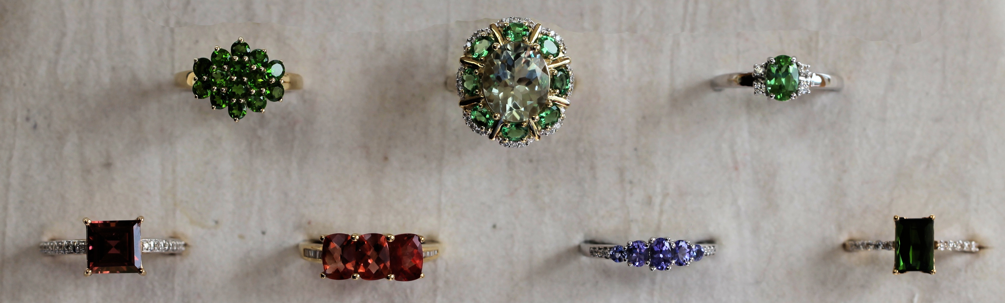 A collection of seven assorted gem set rings