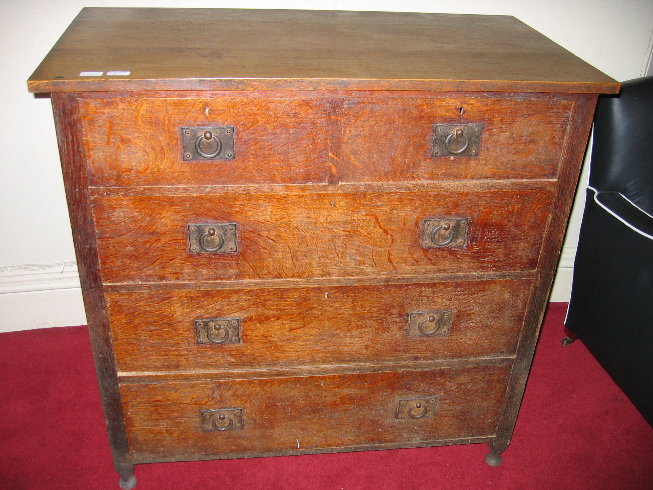 A Heals oak chest of drawers,