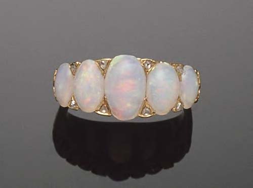 An opal and diamond five stone ring,