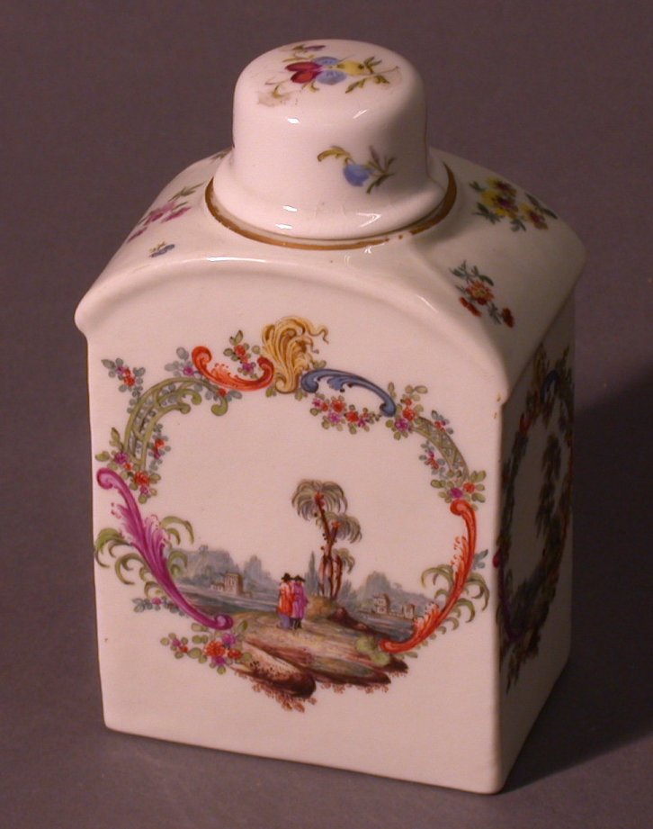 A Berlin style rectangular section tea caddy and cover