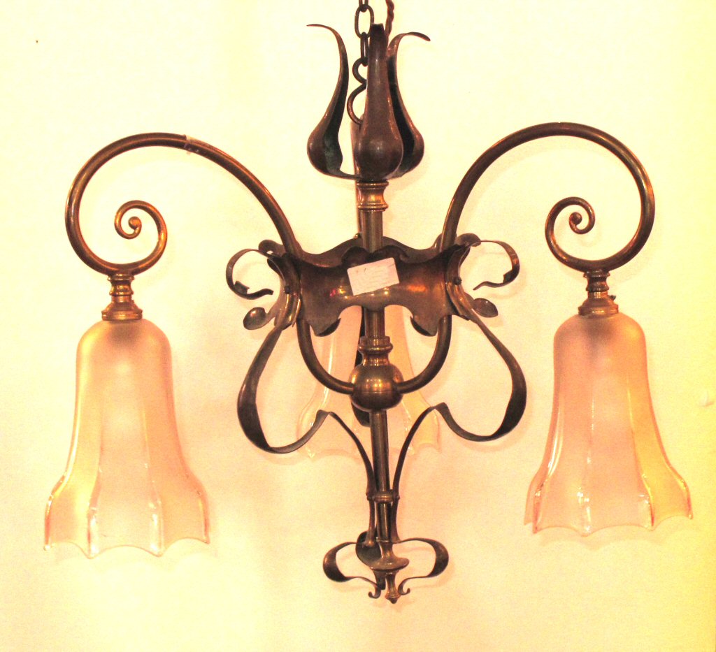 An Arts and Crafts style three branch ceiling light