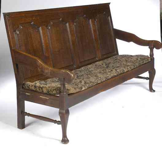 A George III period provincial oak settle