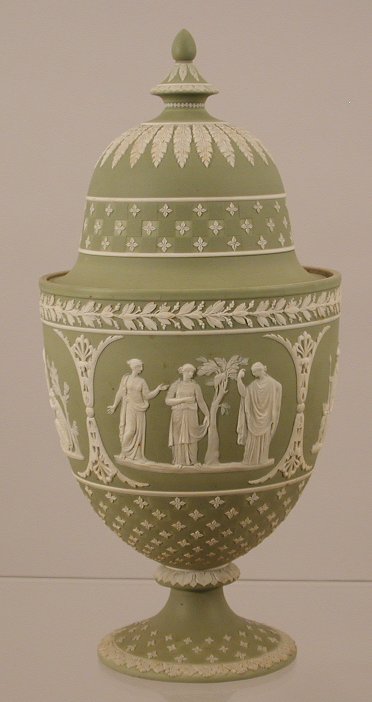 A 19th century Wedgwood green jasperware urn-shaped vase and cover