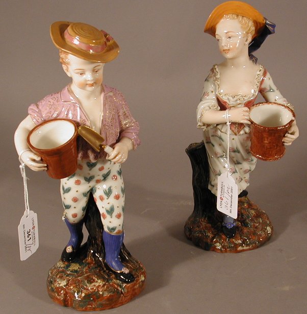A pair of Royal Worcester figures