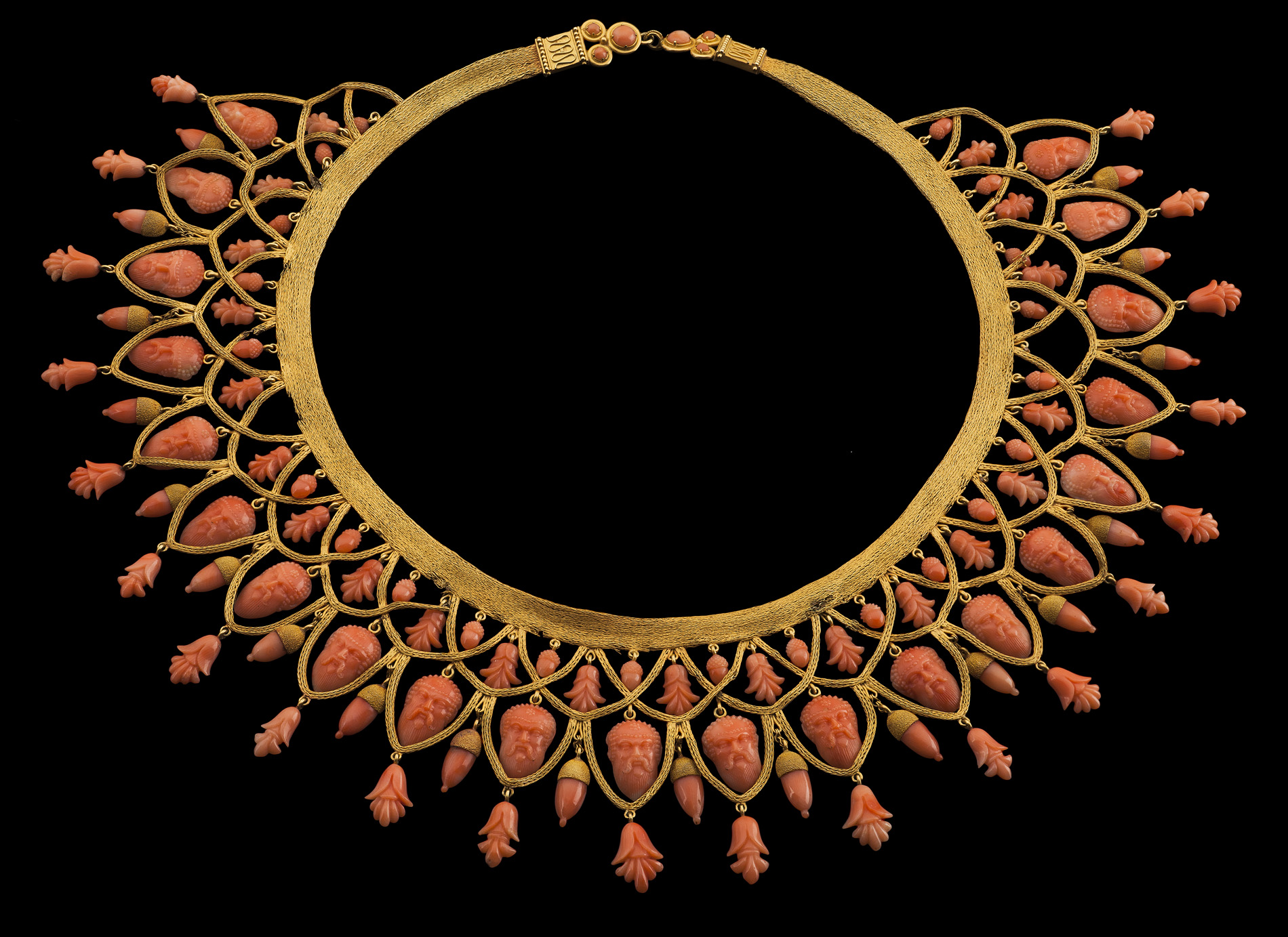 An impressive 19th century carved coral and gold mounted necklace and pendant earrings