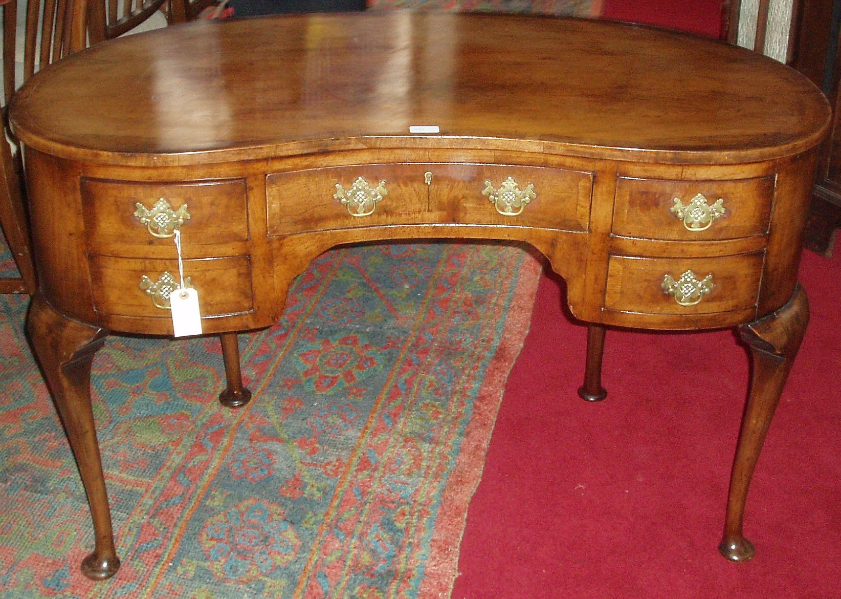 A Kidney-shaped mahogany desk,