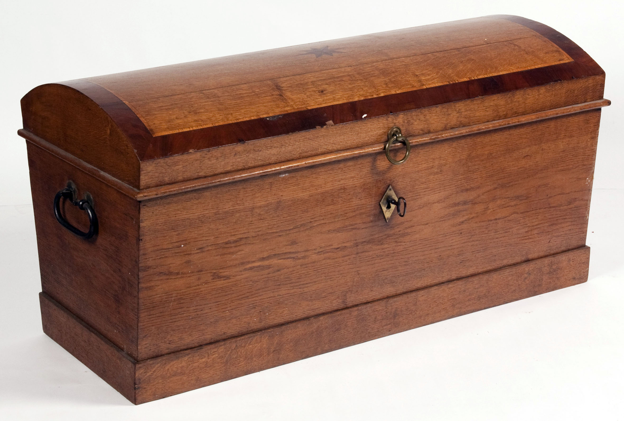 A 19th century oak and mahogany crossbanded German trunk