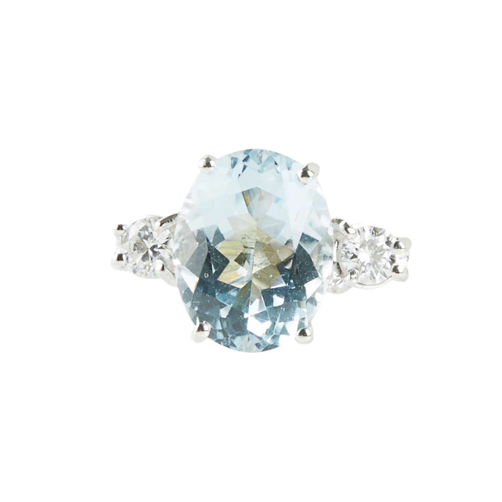 An aquamarine and diamond set ring