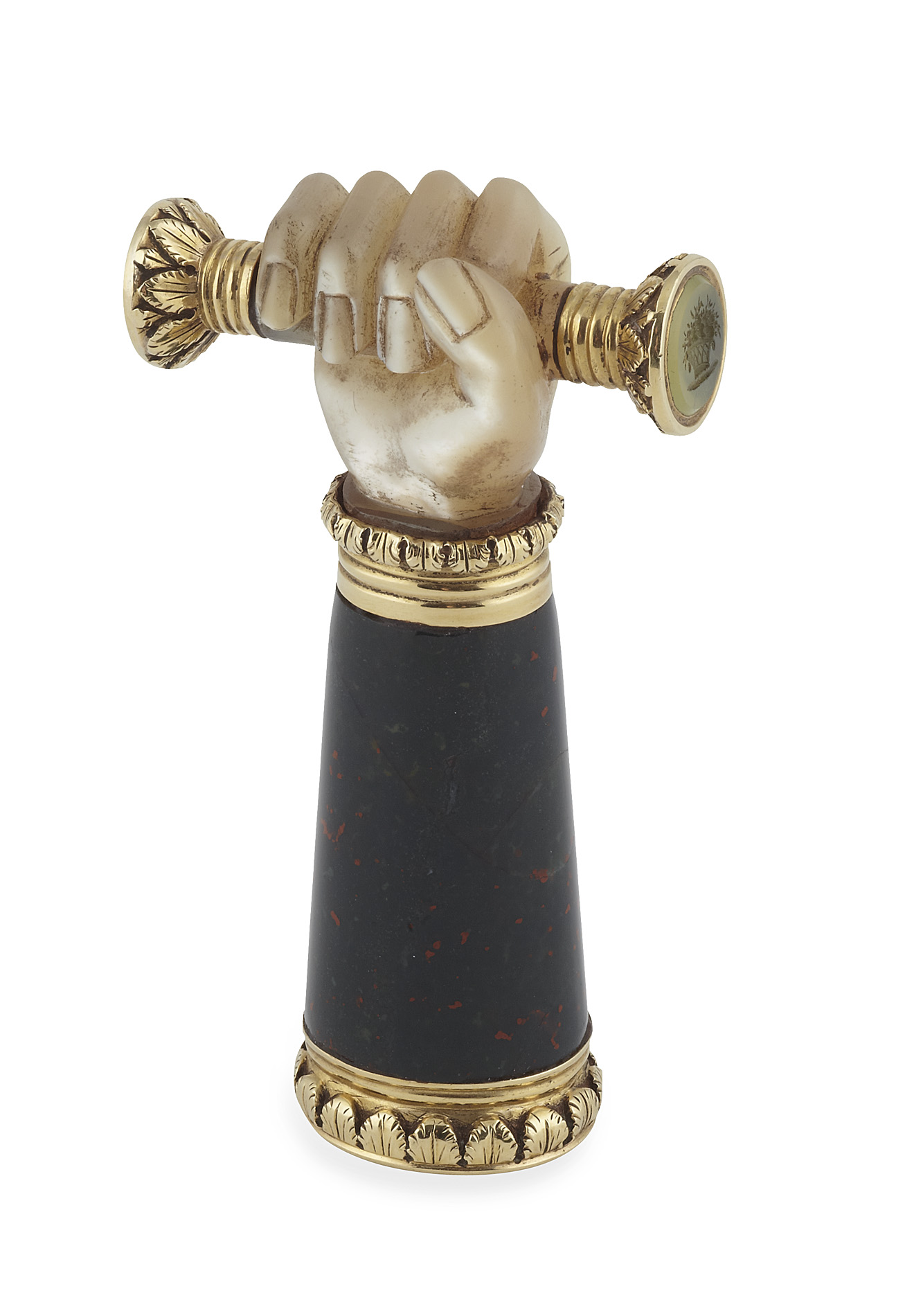 A gold mounted mother of pearl and bloodstone hand seal