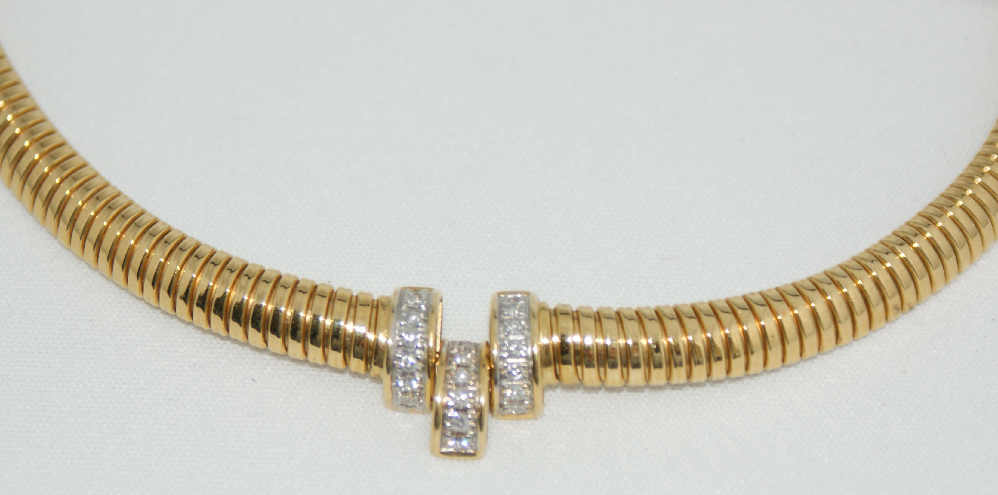 A modern 18ct gold mounted diamond necklace,