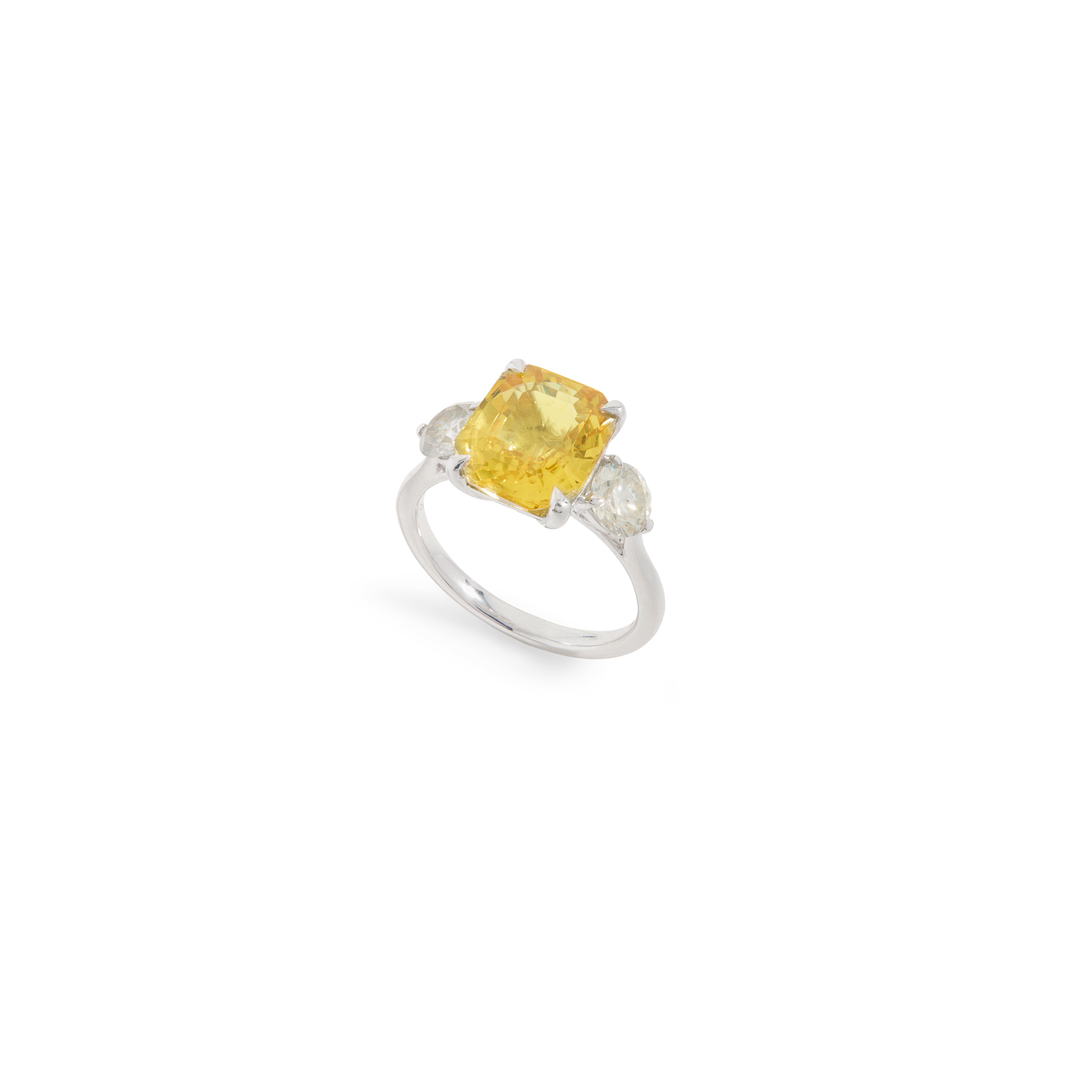A yellow sapphire and diamond ring