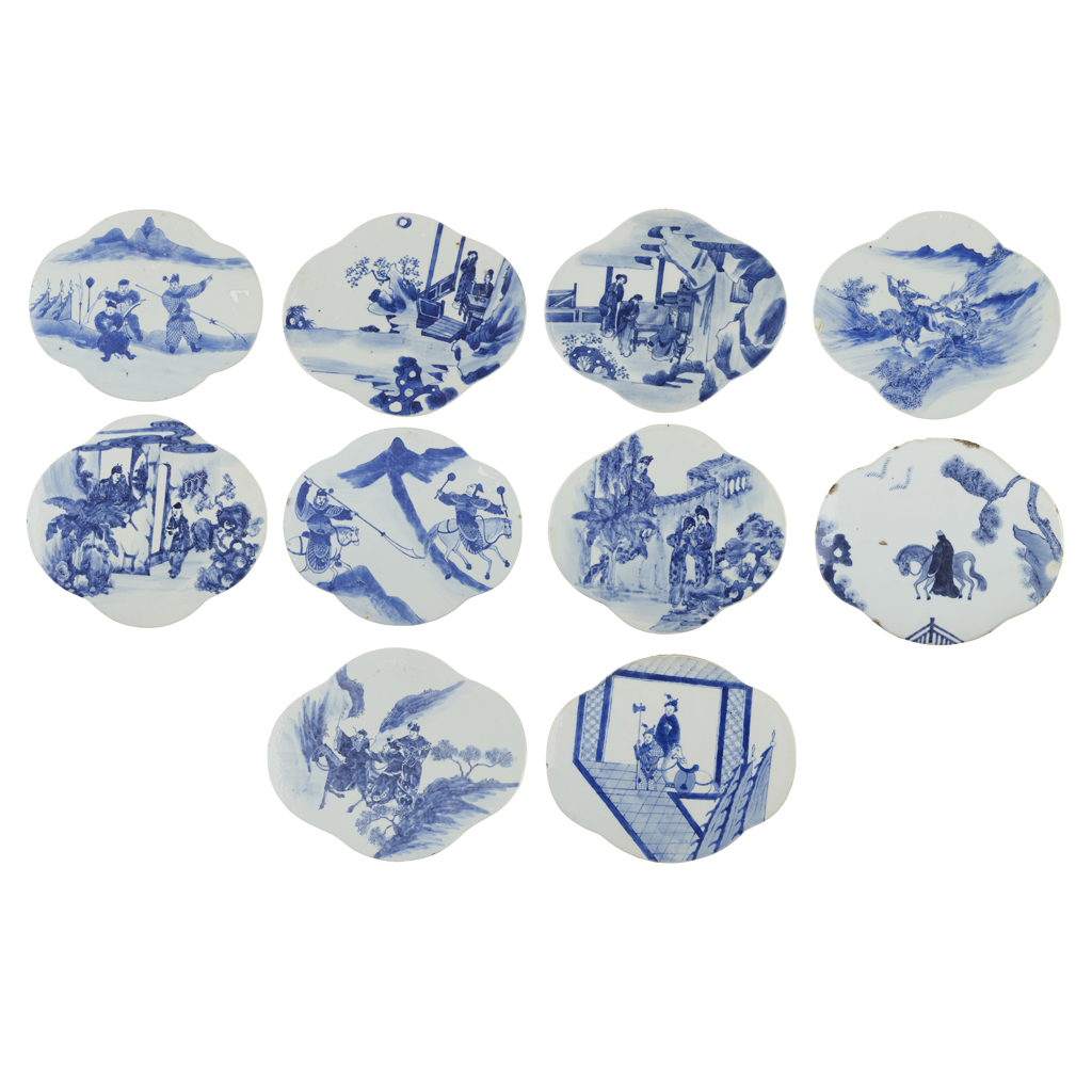 COLLECTION OF TEN BLUE AND WHITE QUATREFOIL PORCELAIN PLAQUES