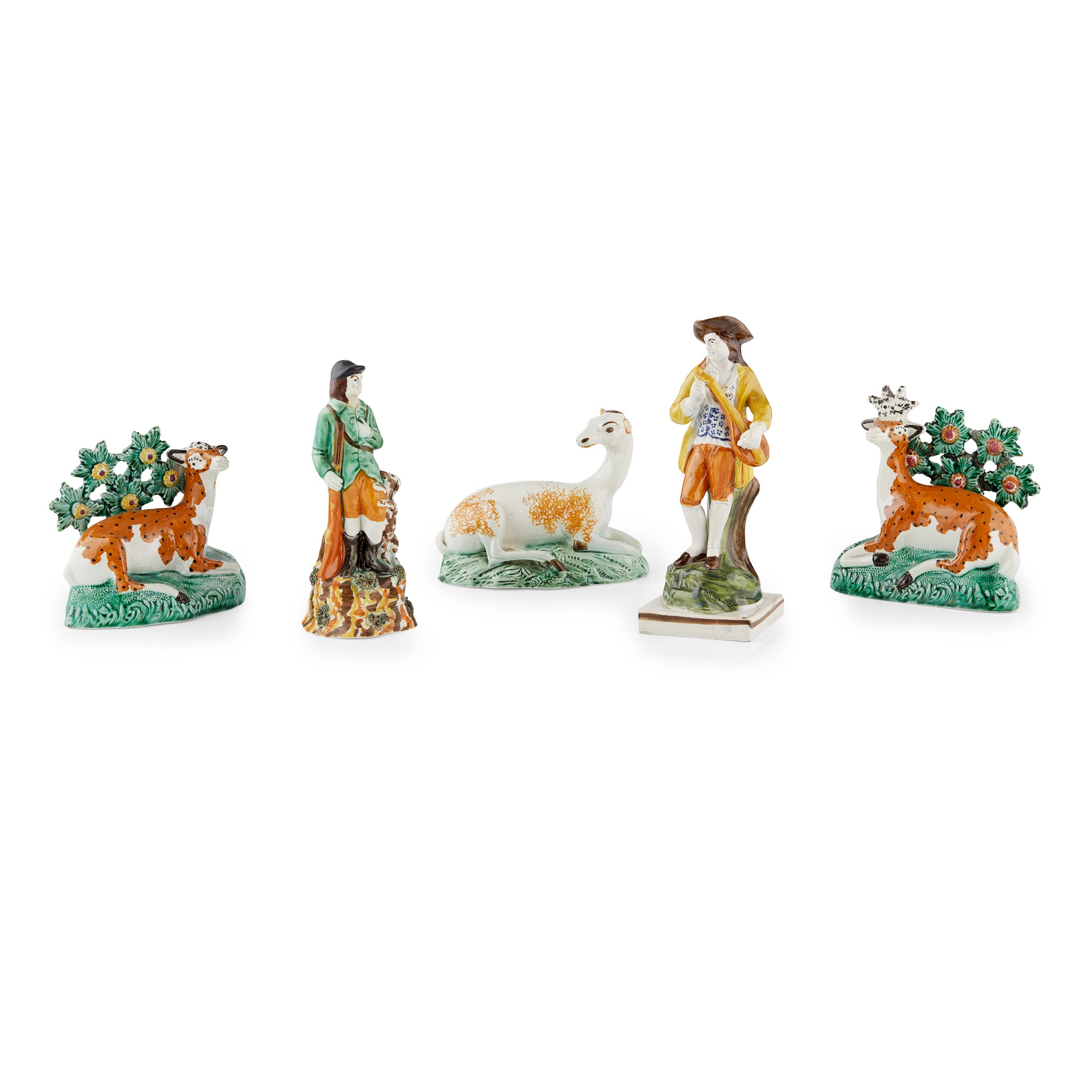 THREE STAFFORDSHIRE PEARLWARE FIGURES OF DEER