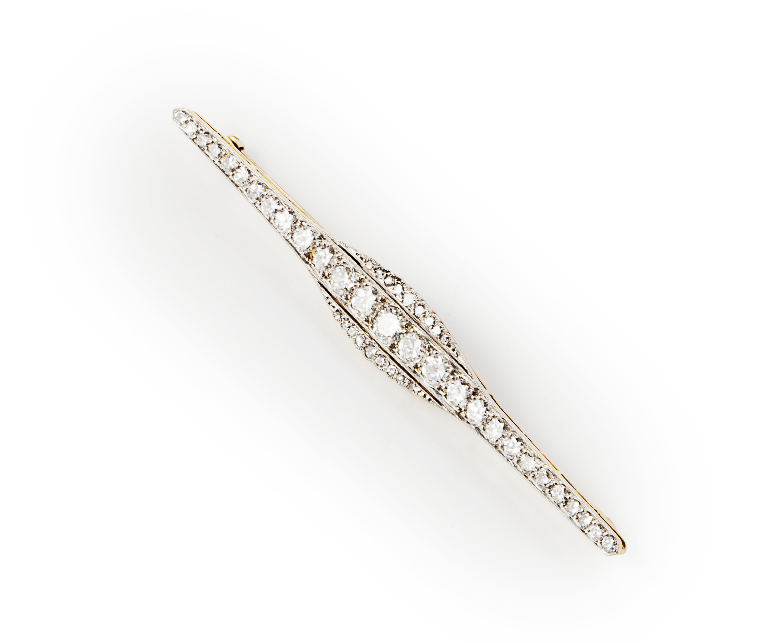 A diamond set bar brooch