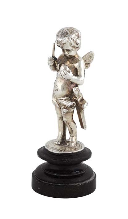 A late 19th century figure of a winged putto