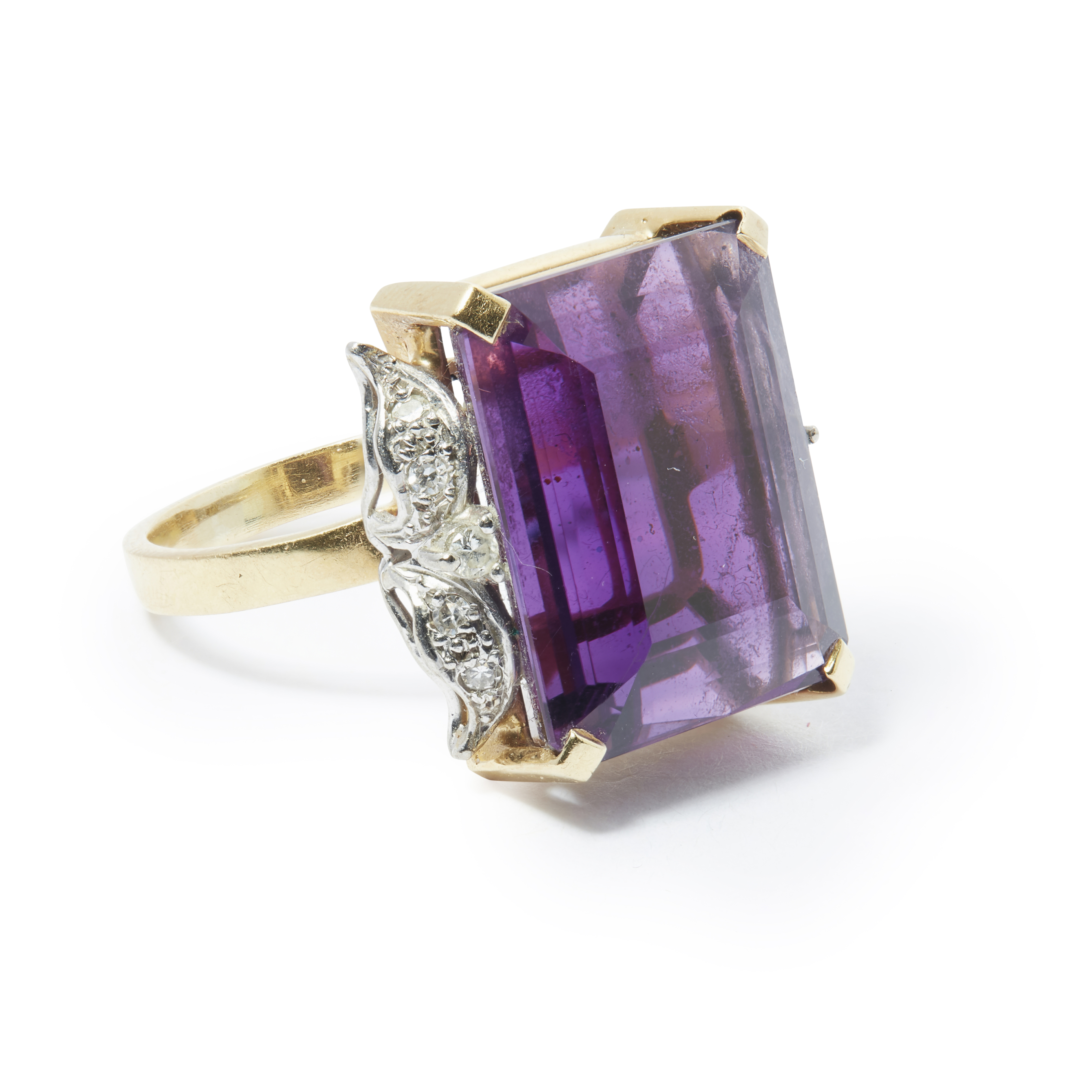 An amethyst set cocktail ring