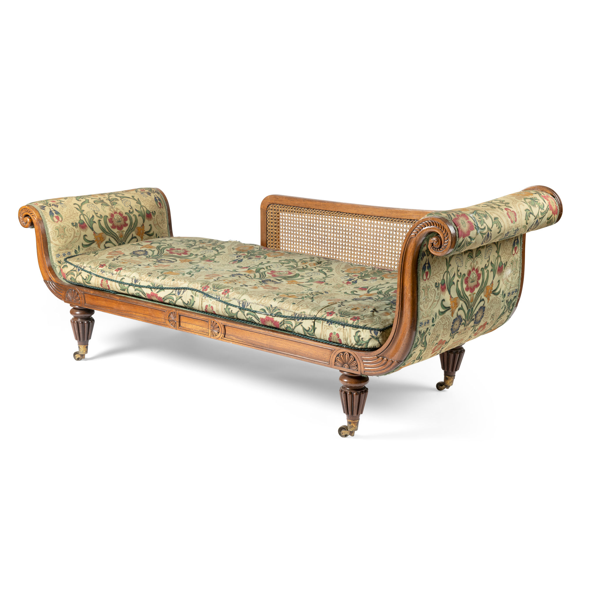 A MAHOGANY AND CANEWORK CHAISE LOUNGE