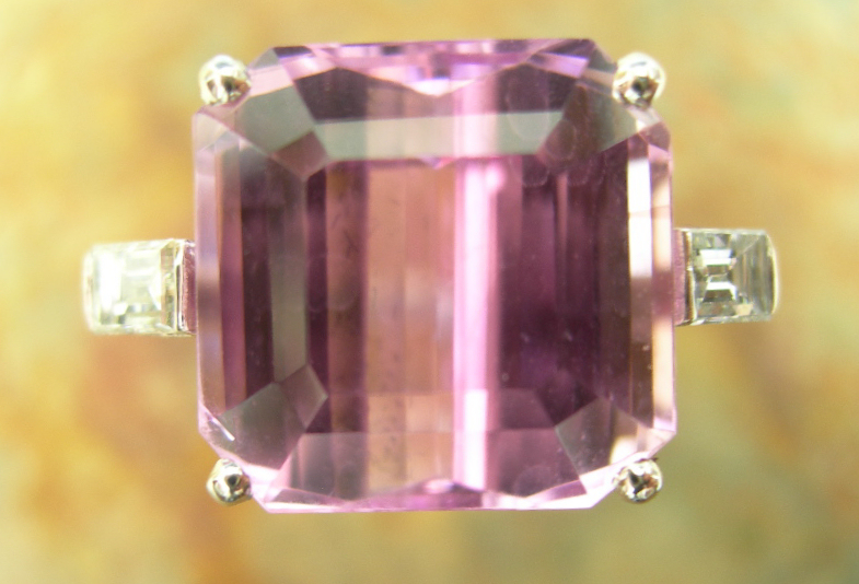 An 18ct white gold mounted kunzite and diamond set cocktail ring,