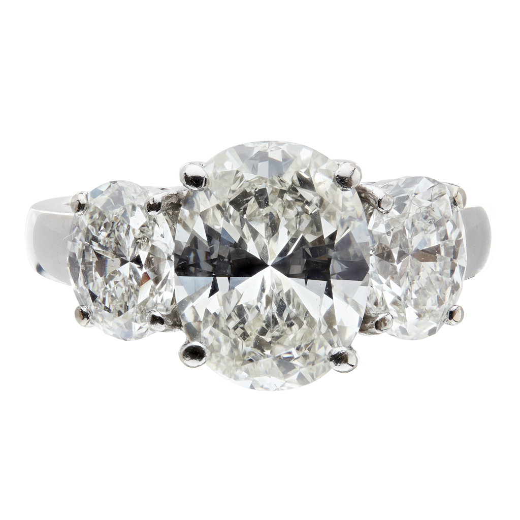 A three stone diamond set ring