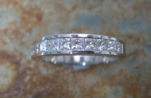 A diamond half-eternity ring,