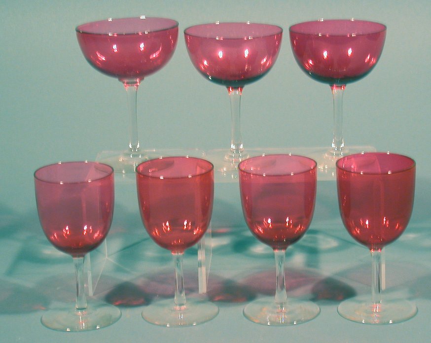 A set of stemmed coloured glasses