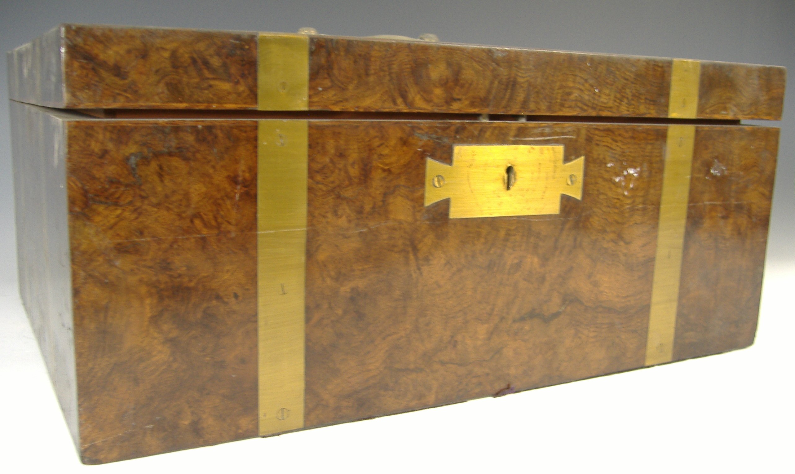 A Victorian brass bound figured walnut jewellery box,