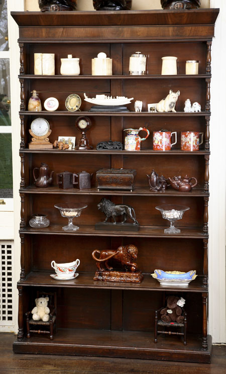 A 19th century walnut waterfall bookcase