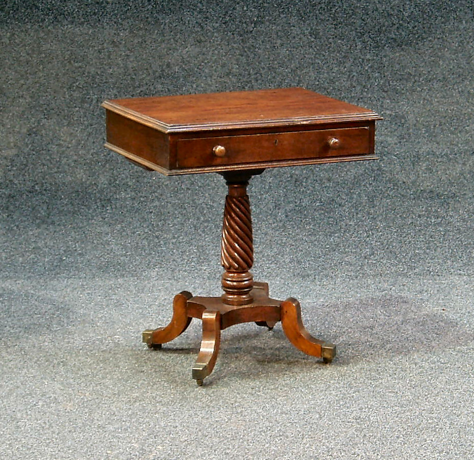 A early 19th century mahogany occasional table