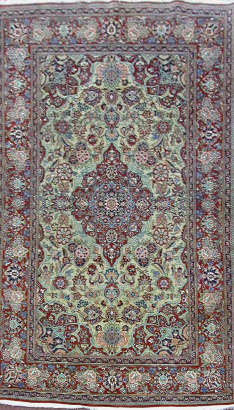 A pair of Kashan rugs,