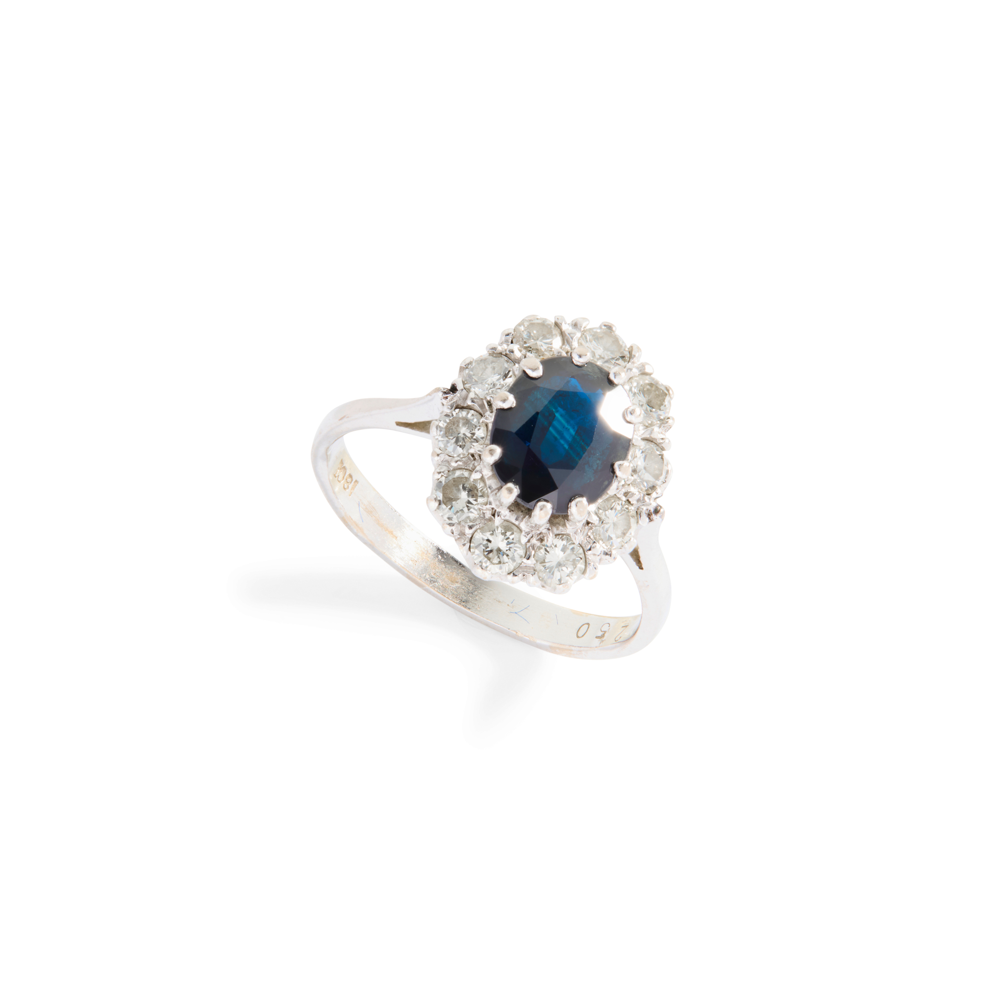 A sapphire and diamond cluster ring