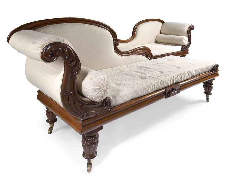 A pair of late Regency period mahogany framed chaise longues in the manner of Gillows of Lancaster