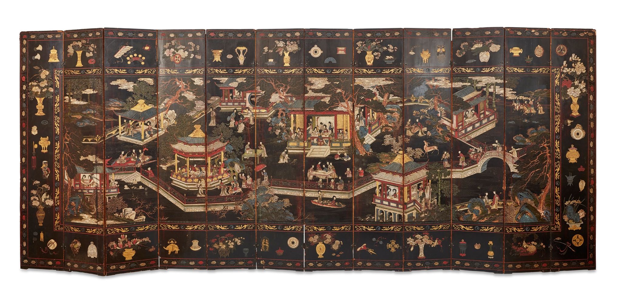 A CHINESE COROMANDEL BLACK LACQUER TWELVE-PANEL SCREEN